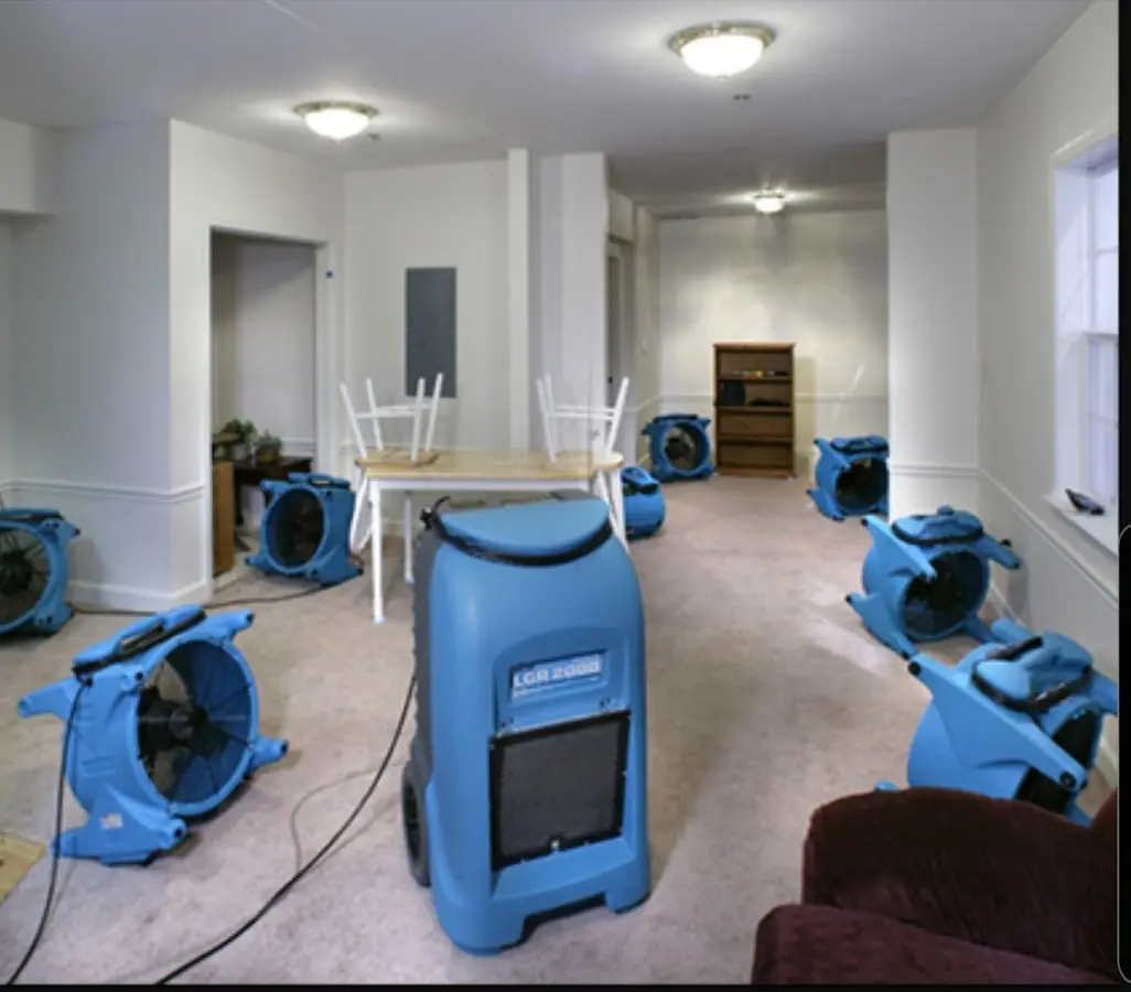 Air movers and dehumidifier setup for Water Damage Restoration in Seattle